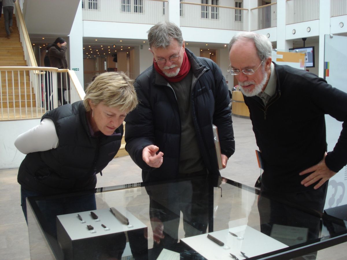 A team from the ANU Centre for Environmental History views artefacts from the Qajaa excavations in western Greenland at the Danish National Museum (from left to right: Christine Hansen, Mike Smith, Tom Griffiths)